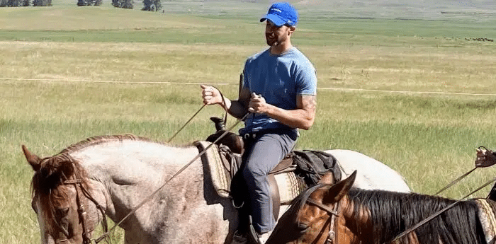 steve riding a horse
